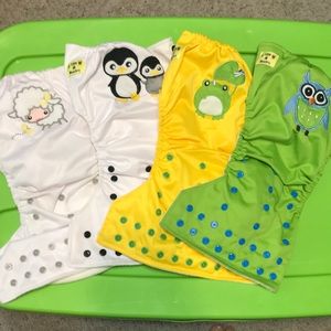 4 Cloth Pocket Diapers.  Inserts included.